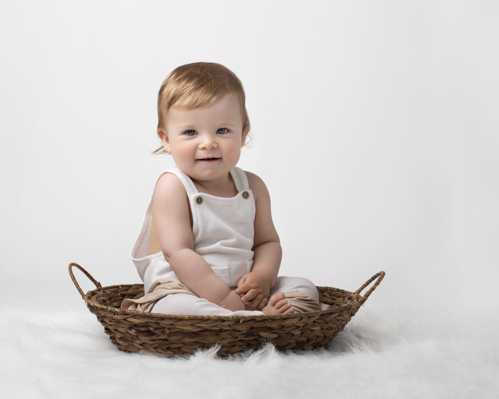 baby in basket by Baby Photographer in Sandwich, Kent